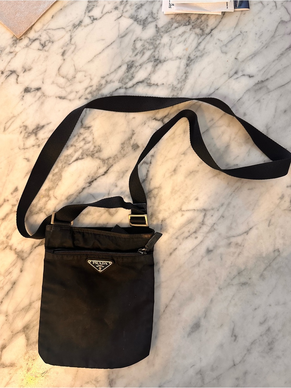 Prada small crossbody bag needs professional cleaning